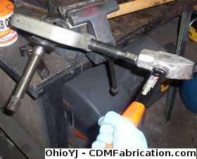 Using a hammer to help remove axle joints